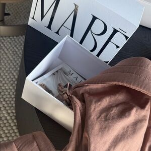 Tan carrier  Bucket Bag with Belt Buckle Detail